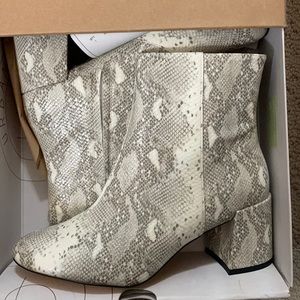 Snakeskin print boots